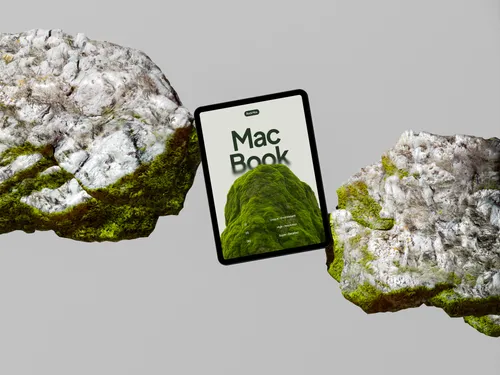 iPad Pro on green rock, floating straight, in a minimalist scene