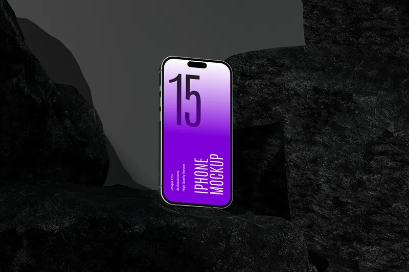 iPhone Pro in dark mode on a rocky surface, viewed from the top.