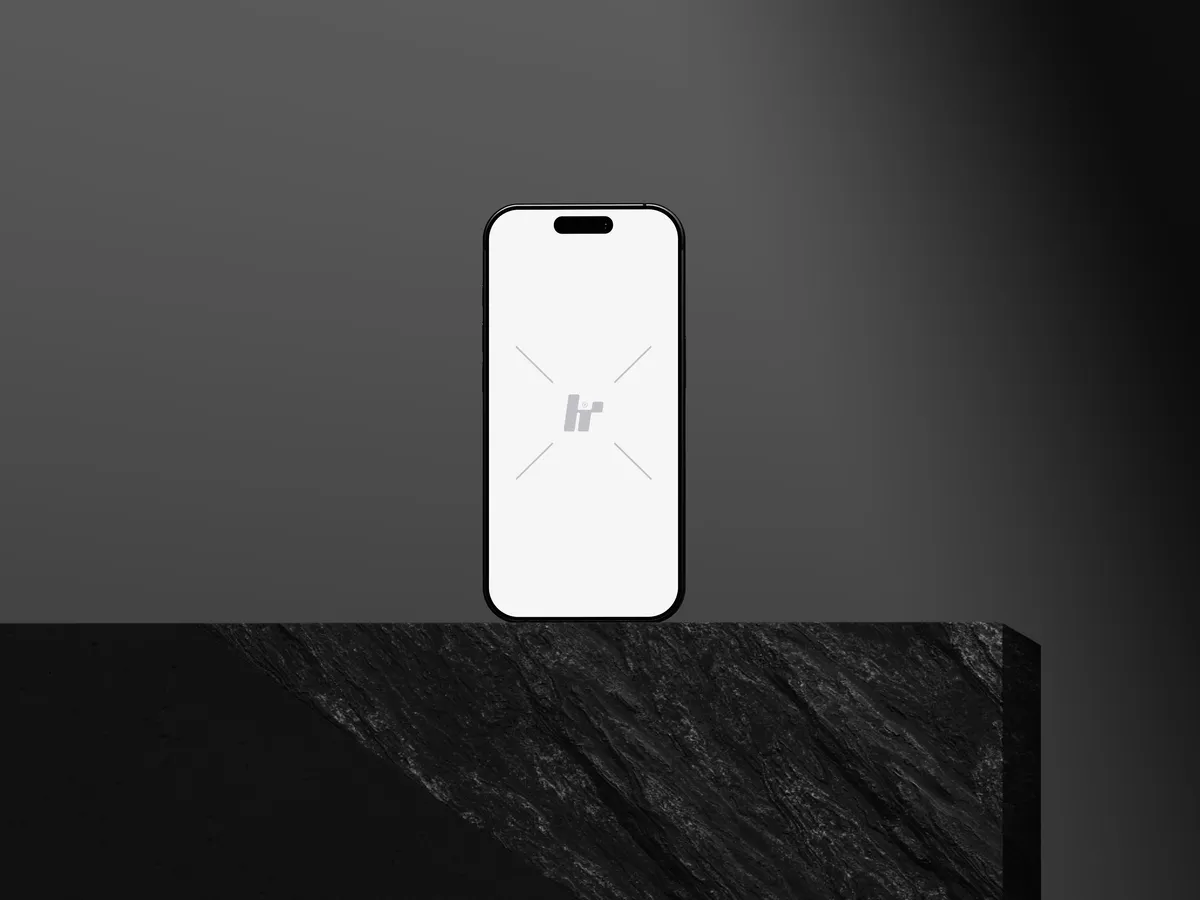 iPhone Pro on a rock cube, straight view.