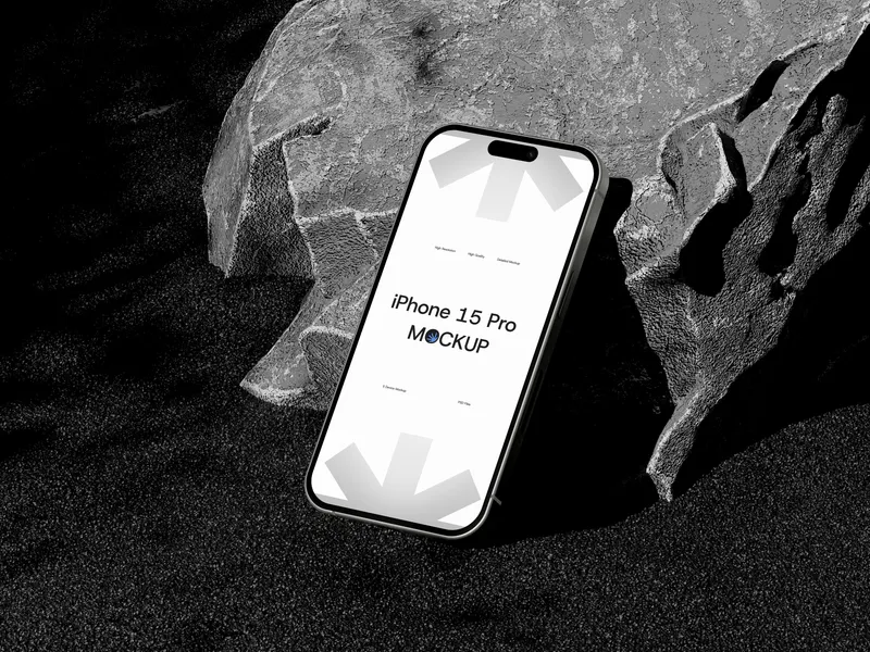 iPhone Pro on rock formation, screen visible, top-right angle view