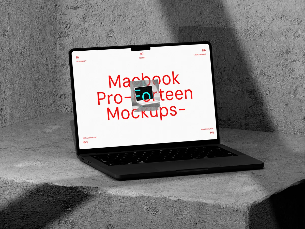 MacBook Pro on concrete, viewed from front left angle.