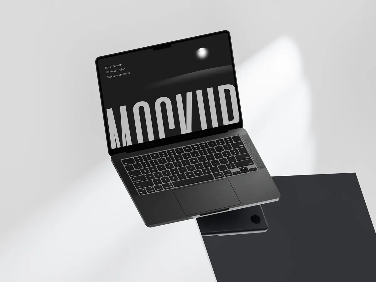 MacBook Pro on dark glass surface, tilted at an angle, with a floating screen effect