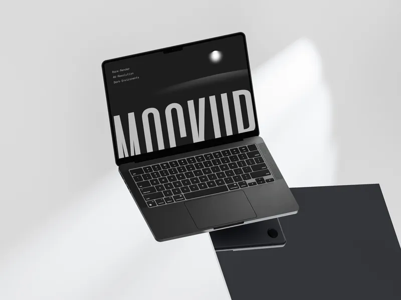 MacBook Pro on dark glass surface, tilted at an angle, with a floating screen effect