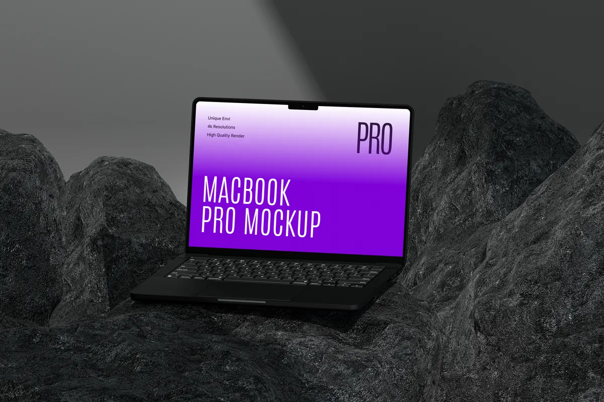 MacBook Pro on dark rock surface, front view
