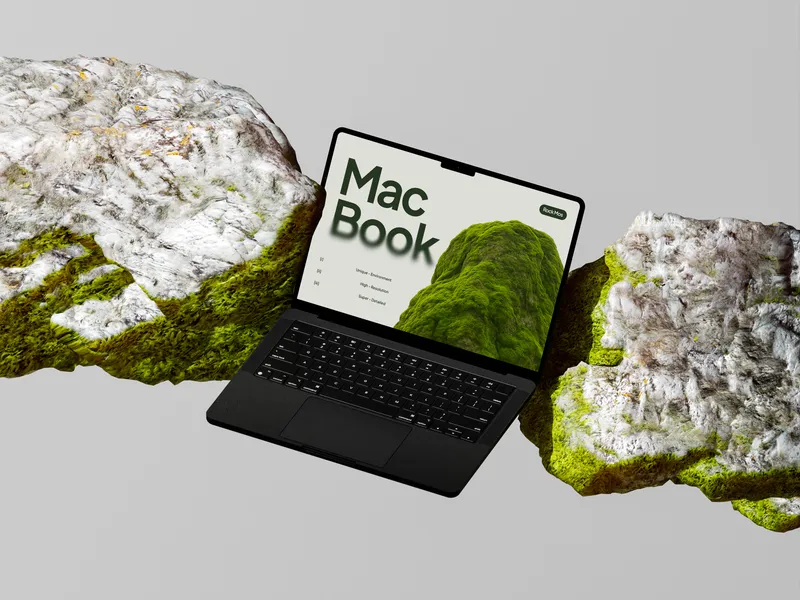 MacBook Pro on green rock, floating at an angle, front view