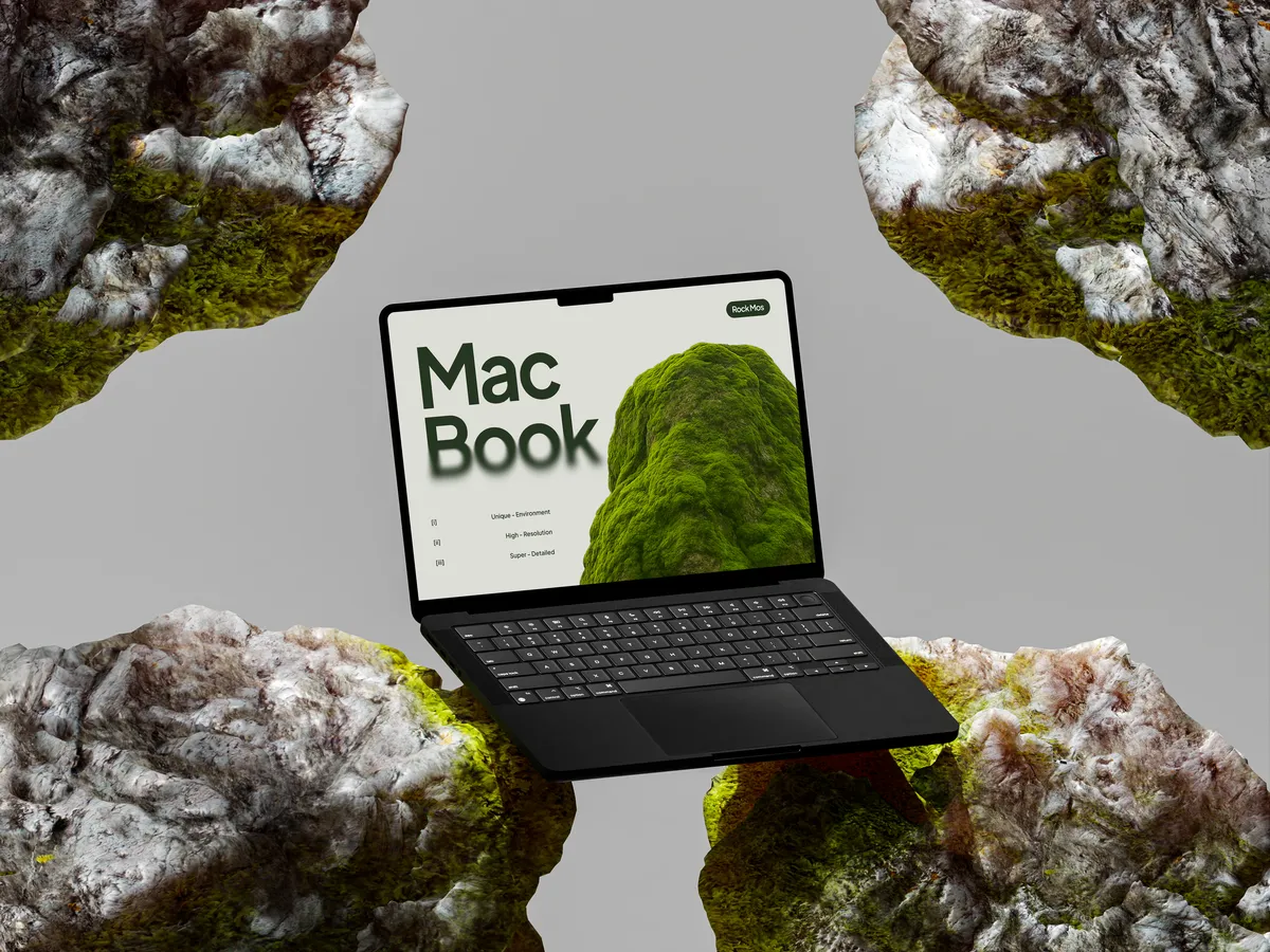 MacBook Pro on green rock, front view