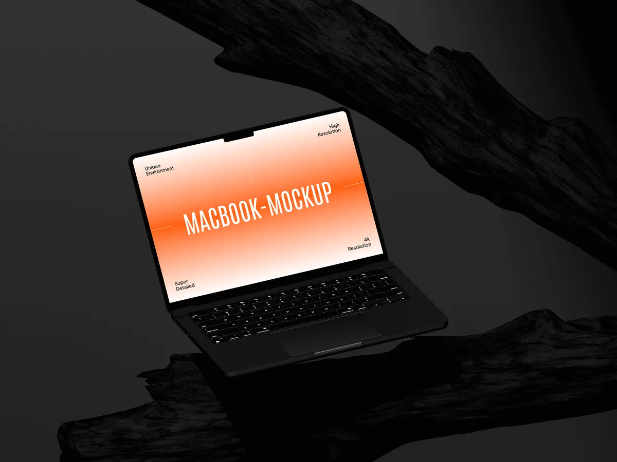 MacBook Pro on rock, tilted, charcoal background