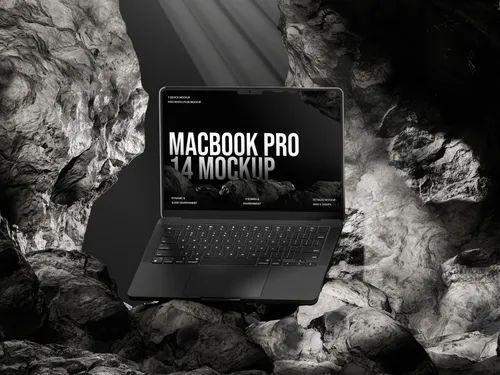 MacBook Pro on rock formation in a cave, front view